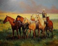 cowboy and his horses
